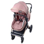 Coche de bebé tipo travel system en color rosad con portabebé desmontable