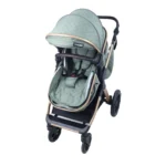 Coche de bebé tipo travel system en color verde con portabebé desmontable