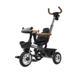 Triciclo para bebé color gris Baby Cam con manija de empuje, asiento acolchado y ruedas resistentes, ideal para paseos seguros
