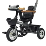 Triciclo para bebé color gris Baby Cam con manija de empuje, asiento acolchado y ruedas resistentes, ideal para paseos seguros