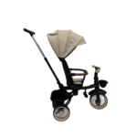 Triciclo Flex Baby Cam beige con capota, manija de empuje, asiento acolchado y canastilla, ideal para paseos seguros del bebé.