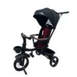 Triciclo Flex Baby Cam rojo negro con capota, manija de empuje, asiento acolchado y canastilla, ideal para paseos seguros del bebé.