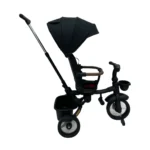 Triciclo Flex Baby Cam rojo negro con capota, manija de empuje, asiento acolchado y canastilla, ideal para paseos seguros del bebé.