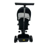 Triciclo Flex Baby Cam rojo negro con capota, manija de empuje, asiento acolchado y canastilla, ideal para paseos seguros del bebé.