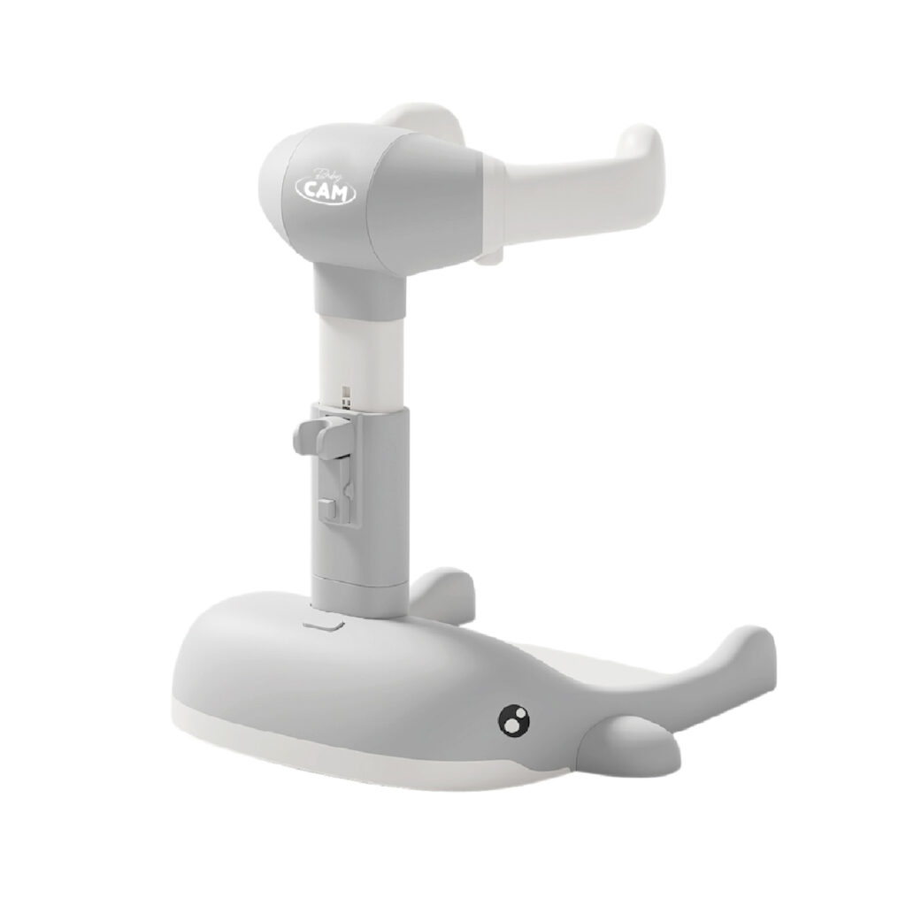 Soporte para baño Nubbi Baby Cam gris con diseño de ballena y estructura ajustable en altura.
