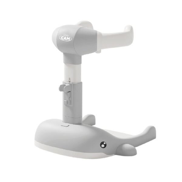 Soporte para baño Nubbi Baby Cam gris con diseño de ballena y estructura ajustable en altura.