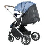Coche para bebé Tokio New azul con asiento acolchado, bandeja frontal y ruedas giratorias con suspensión para paseos cómodos y seguros.