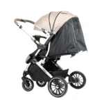 Coche para bebé Tokio New beige con asiento acolchado, bandeja frontal y ruedas giratorias con suspensión para paseos cómodos y seguros.