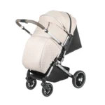 Coche para bebé Tokio New beige con asiento acolchado, bandeja frontal y ruedas giratorias con suspensión para paseos cómodos y seguros.